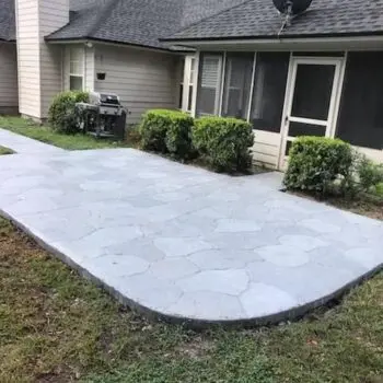 Stamped concrete patio backyard installation