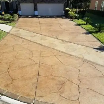Stained decorative concrete driveway installation