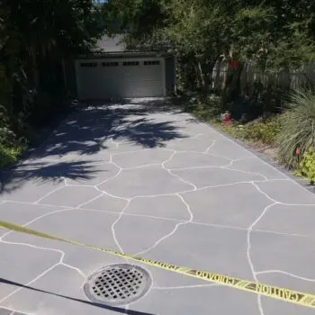 Newly installed concrete driveway repair