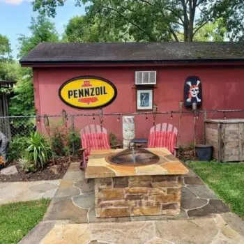 Outdoor patio with stone fireplace