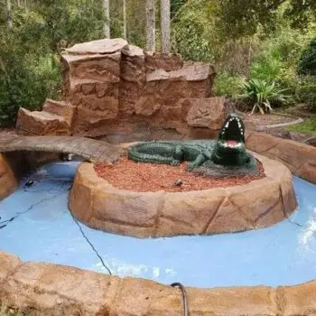 Backyard pool alligator statue