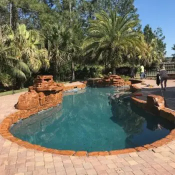 Backyard pool with stone features