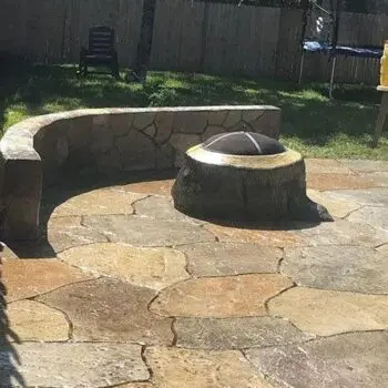 Outdoor stone patio with firepit