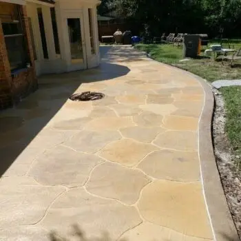 Stamped concrete driveway backyard patio
