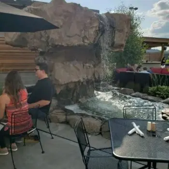 Outdoor patio with rock waterfall