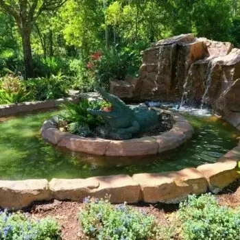 Garden pond with rock waterfall