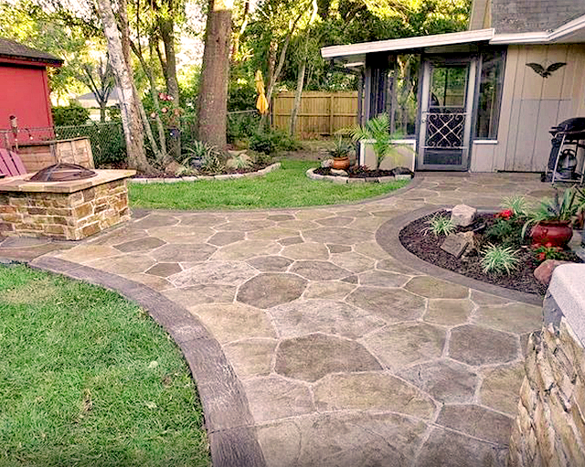 Elegant stone patio backyard design